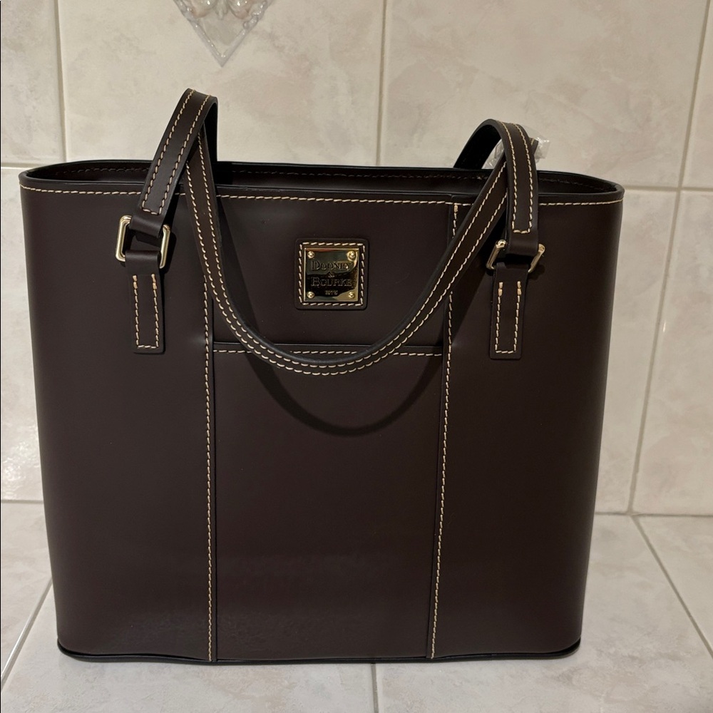 Dooney and Bourke Quincey Small Lexington Tote Bag in Brown Tmoro Leather.